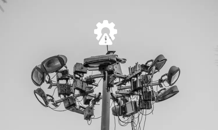 LED vs Traditional Street Lighting Comparison Side-by-side comparison showing the bright, focused illumination of LED street lights versus the diffused glow of traditional sodium lamps on an urban street.