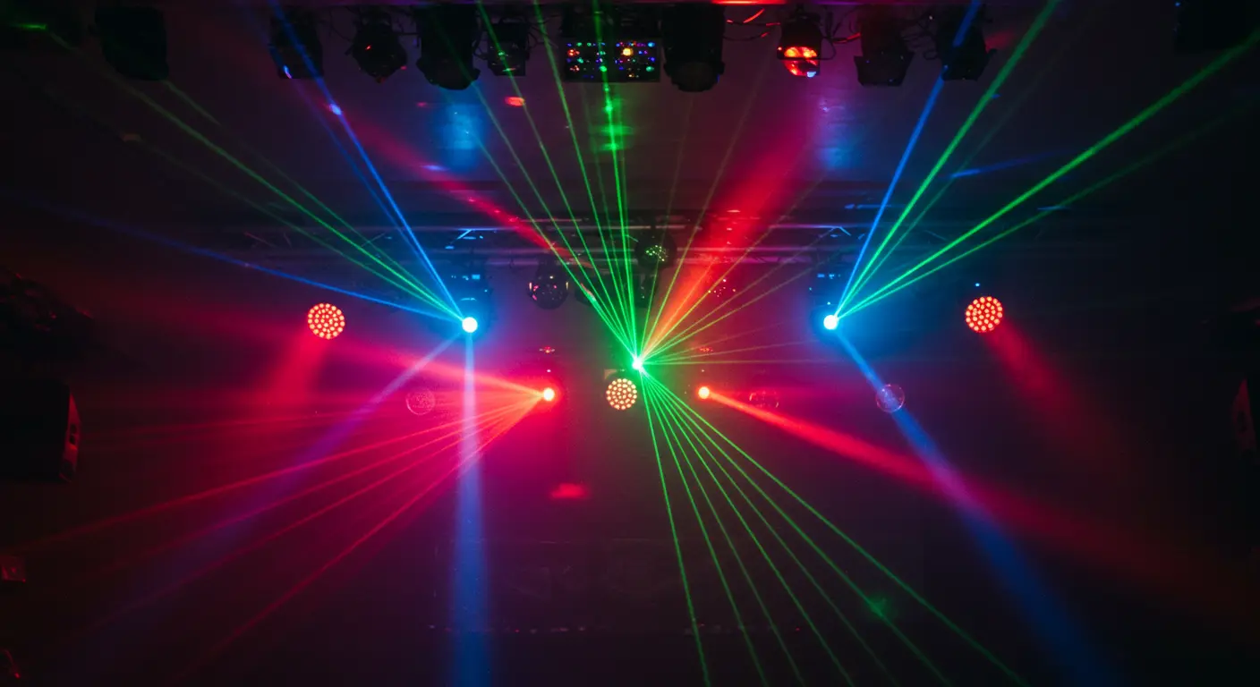 A lighting technician sets up a Sundrax RadioGate transceiver to transmit DMX signals wirelessly across a rotating theater stage using the beDMX protocol.