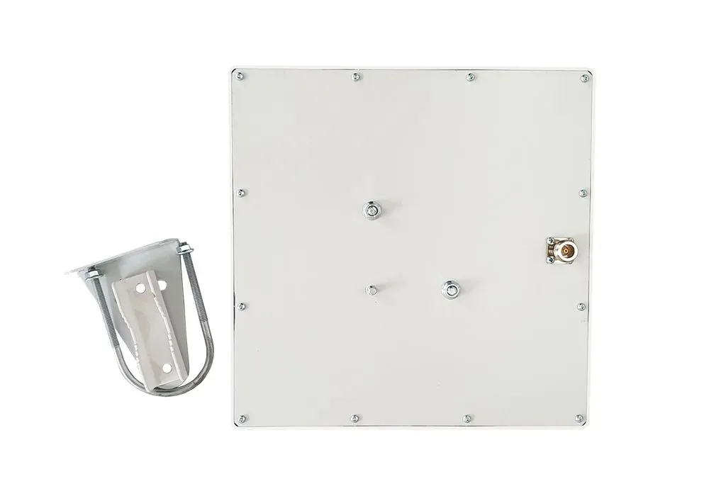 A robust outdoor antenna mounted on a wall with a specialized bracket, enhancing wireless DMX signal range for stage lighting setups. Architectural Lighting MONARQ Wall mount Bluetooth antenna