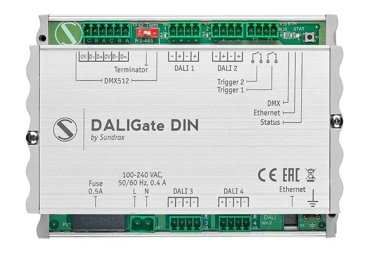 DMX-DALI gateway device mounted on DIN rail in electrical cabinet