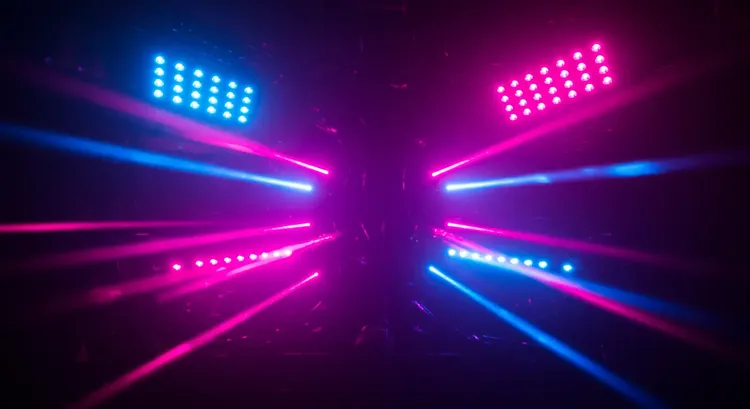 DMX signal cables connected to lighting fixtures on a building 