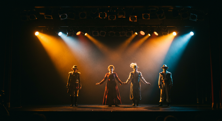 Stage lighting transforms costumes and scenery through colour, texture, and brightness.