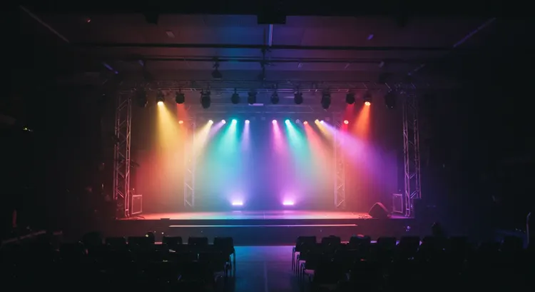 Technical diagram illustrating how PixelGate integrates into a professional lighting network, converting Art-Net and sACN protocols over Ethernet to standard DMX512 and SPI for addressable LED control.